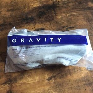 Gravity weighted sleep mask